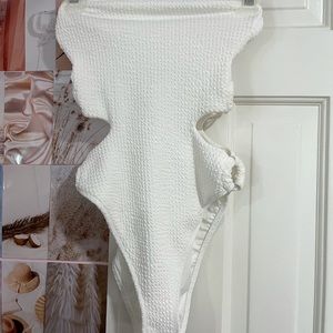 white strapless one piece swim suit